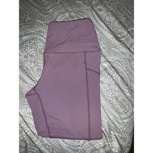 purple dry-fit leggings with pockets